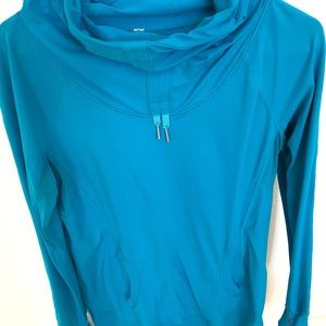 Lululemon pullover with ponytail on the hood. Like new size 8